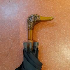 مظلة noir، كما تم الإبلاغ عنه بواسطة TCL عبر iLost