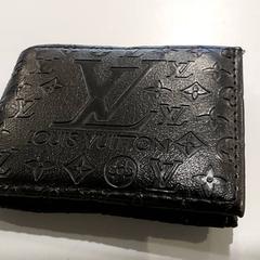 Carteira - Gusani, como reportado por Centraal magazijn utilizando o iLost