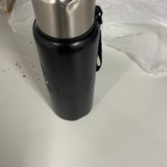 زجاجة ماء، كما تم الإبلاغ عنه بواسطة Silver Sands Beach عبر iLost