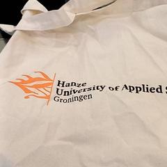 Borsa di lino, come riportato da Qbuzz GD Groningen HS utilizzando iLost