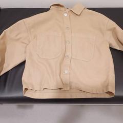 Jacka beige, rapporterat av RÍO Shopping - Valladolid med iLost