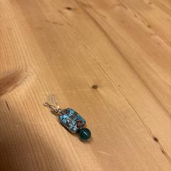 Earring, come riportato a iLost