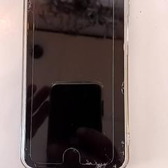 Iphone Achterkant grijs, magneet, en ee pasfoto, ha sido reportado por RRReis IJssel-Vecht con iLost