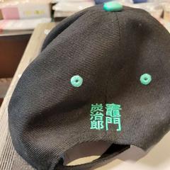 Casquette noire et verte, as reported by TCL using iLost