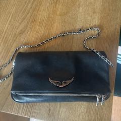 Tas van Zadig en Voltaire, som rapportert til iLost