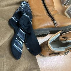 Kabát, Csizma & Zokni, amint azt Sheraton Brussels Airport Hotel az iLost segítségével jelentette.