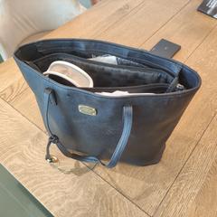 Tas met inhoud B.I. de Ruijter, som rapportert til iLost