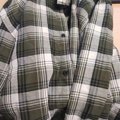 Camisa, segundo informou The Dominican usando iLost