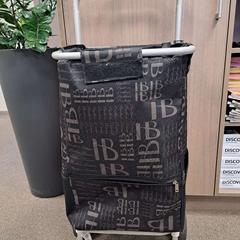 Carriño da compra zwart, segundo informou Regio Limburg - Leuven usando iLost