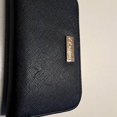 Cartera Snelton, segons ha informat Connexxion Haarlem IJmond mitjançant iLost