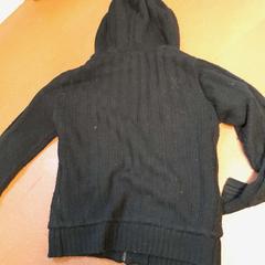 Pull noir, a été signalé par TCL utilisant iLost