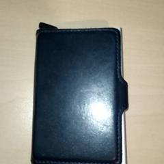 Kaartenhouder Van den Bosch, jak nahlášeno Centraal magazijn pomocí iLost