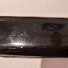 Étui à lunettes noir, a été signalé par TCL utilisant iLost