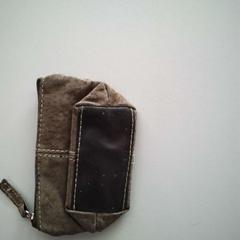 Porte-monnaie، كما تم الإبلاغ عنه بواسطة Twisto عبر iLost