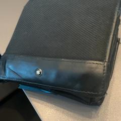 Carteira Cesar Garcia Estrella, como reportado por MEININGER Hotel Amsterdam Amstel utilizando o iLost