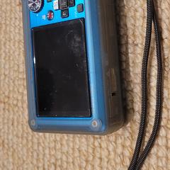 Grijze boodschappen tas met compact camera, som rapporterats till iLost