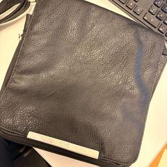 Bag leather black, as reported by Ramada by Wyndham Amsterdam Airport Schiphol using iLost