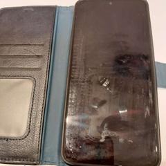 Téléphone portable noir Honor, a été signalé par TCL utilisant iLost