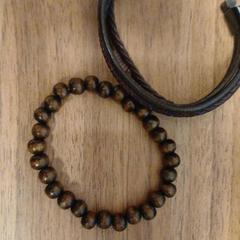 Náramek wooden beads, leather, jak nahlášeno MEININGER Hotel Amsterdam City West pomocí iLost