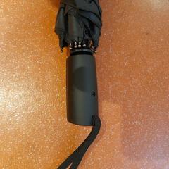 مظلة قابلة للطي noir، كما تم الإبلاغ عنه بواسطة TCL عبر iLost