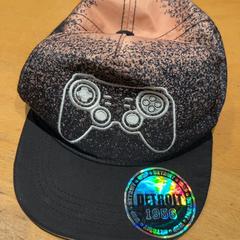 Gorra de béisbol, segundo informou Pathé Ede usando iLost