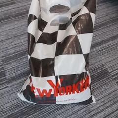 Saco de plástico met kleding, como reportado por Arriva Limburg Zuid utilizando o iLost