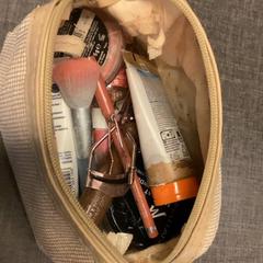 Clutch bag Beige, as reported by MEININGER Hotel Brussels City Center using iLost