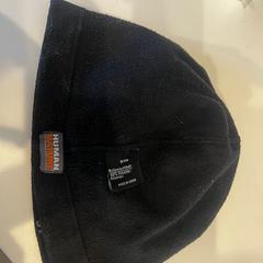 Muts zwart, fleece stof, merk human nature, segons ha informat TU/e - Receptie Vector mitjançant iLost