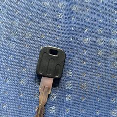 (Fiets) Sleutel met zwarte houder erboven, segons s'ha informat a iLost