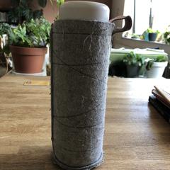 Inu! Drinkfles glas, segons s'ha informat a iLost