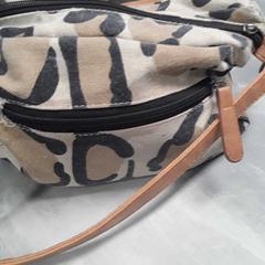 Tas beige Ring, as reported by Arriva Friesland / Groningen using iLost