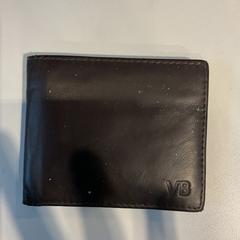 Portfel op naam van Gurulea, Moldavië, zgłoszono przez Gemeente Amsterdam przy użyciu iLost