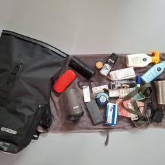 Zwarte ortlieb tas met inhoud, gerapporteerd met iLost