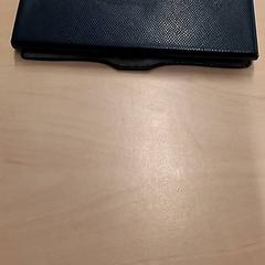 Estuche para lentes con lentes, segundo informou RET usando iLost