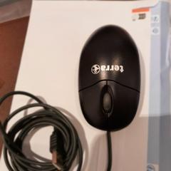 فأرة الكمبيوتر noire، كما تم الإبلاغ عنه بواسطة TCL عبر iLost