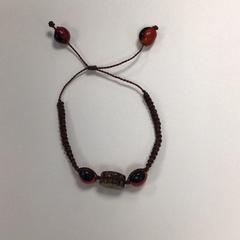 Armband Bruin, rapporterat av HvA Amstelcampus med iLost