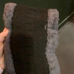 Nekwarmer, zoals gemeld door MEININGER Hotel Brussels City Center met iLost