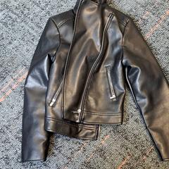 Haurrentzako jaka Zwart leer, gisa salatu by Connexxion Haarlem IJmond iLost erabiliz