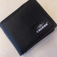 Plånbok, rapporterat av HTM med iLost