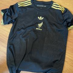Tshirt, as reported by Down The Rabbit Hole using iLost
