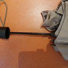 Ombrello pieghevole beige, come riportato da TCL utilizzando iLost