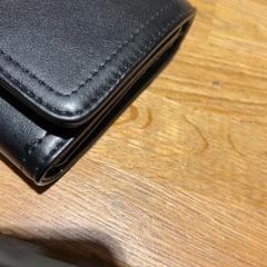 Carteira wallet, como reportado por Designer Outlet Roermond utilizando o iLost