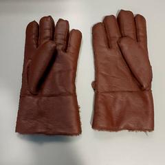 Handschoenen bruin leder, amint azt Regio Limburg - Leuven az iLost segítségével jelentette.