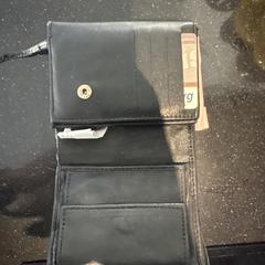 Zwarte portemonnee, segons s'ha informat a iLost