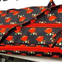 Borsa zwart - rode bloemen, come riportato da Centraal magazijn utilizzando iLost