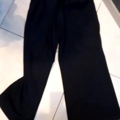 Black stradivarius pants, som rapportert av Leonardo Royal Hotel Amsterdam ved bruk av iLost