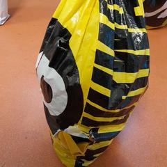 İLost kullanarak TCL tarafından bildirildiği gibi Çanta plastique noir et jaune