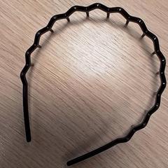 Haarband Zwart, zoals gemeld door Qbuzz Fryslân met iLost
