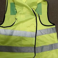 Ruházat Fluo hesje, amint azt Regio Antwerpen - Brussel az iLost segítségével jelentette.