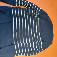 Hettegenser bleu marine et blanc, som rapportert av TCL ved bruk av iLost